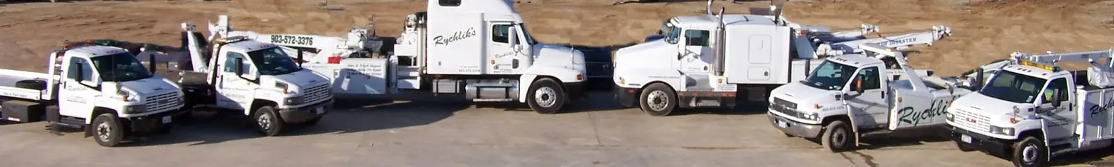 The Rychlik's fleet of wreckers and service trucks